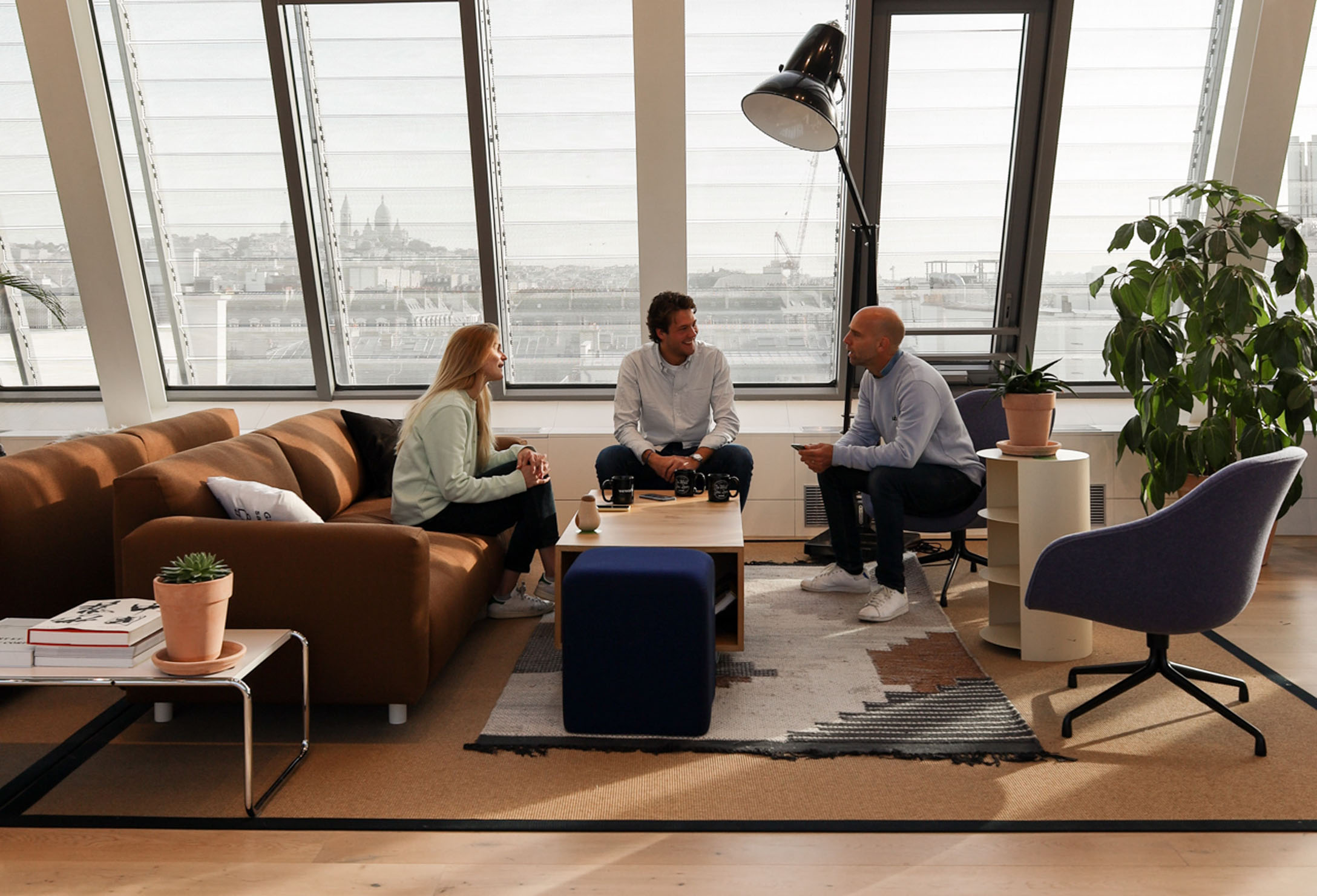Three people collaborating in an office